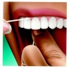 Figure 14. Be sure to clean beneath the gingiva, but avoid snapping the floss on the gingiva (Image courtesy of Colgate).