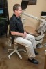 Fig 14. A properly adjusted chair allows a natural lumbar lordosis (curve), with the hips slightly more elevated than the knees.