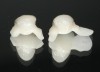 Two zirconia winged resin bonded bridges replacing Nos. 7 and 10. The wings and frame are 100% zirconia. Porcelain has been pressed over the frame, creating the veneers Nos. 7 and 10.