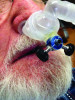 Fig 9. Combination therapy with CPAP and an oral appliance. The CPAP interface (nasal pillows) is secured to a post extending from the upper component of a TAP appliance to obtain its support and stability. More common than the arrangement shown here, the CPAP mask and oral appliance are not inter-connected (Figure courtesy of Dr. Martin Denbar, Austin, Texas).
