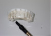 Template made over ideal model of desired shape and contour of teeth to aid in injection molding.