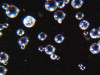 (4.) appear perfectly round and smooth, lacking any sharp edges, making them ideal for cleaning glass-ceramic surfaces without causing microcracks. In contrast, aluminum oxide
