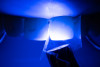 (26.) Correction and removal of composite excess, followed by light polymerization.